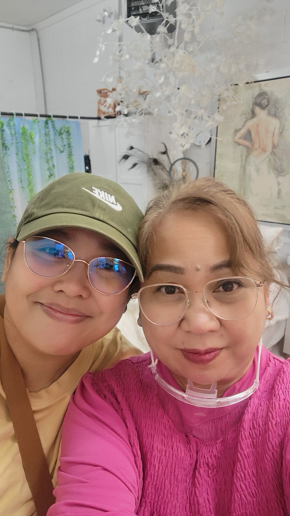 A smiling selfie together in the studio