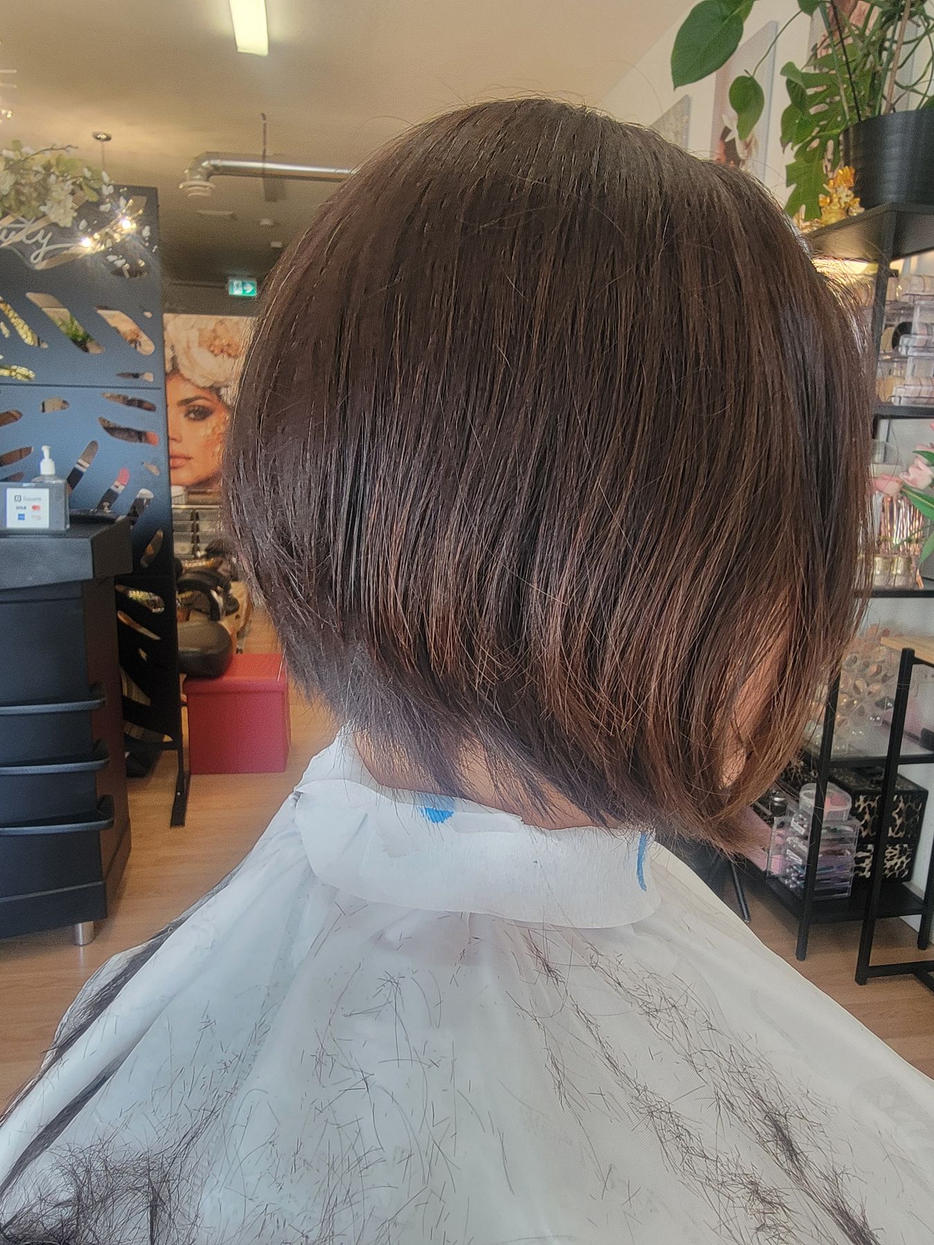 Fresh stacked bob cut photographed from behind