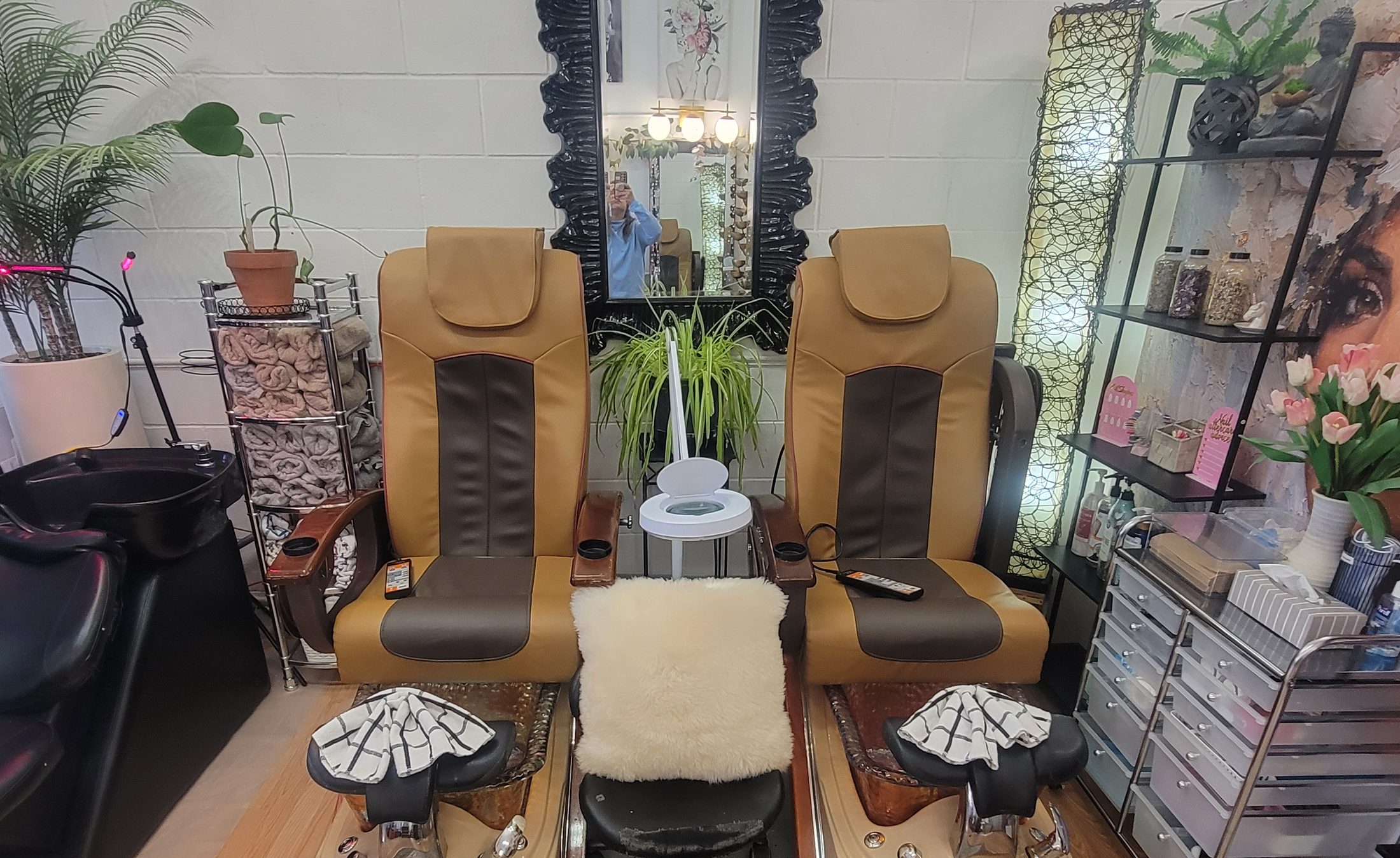 Two leather pedicure spa chairs at JasBeauty